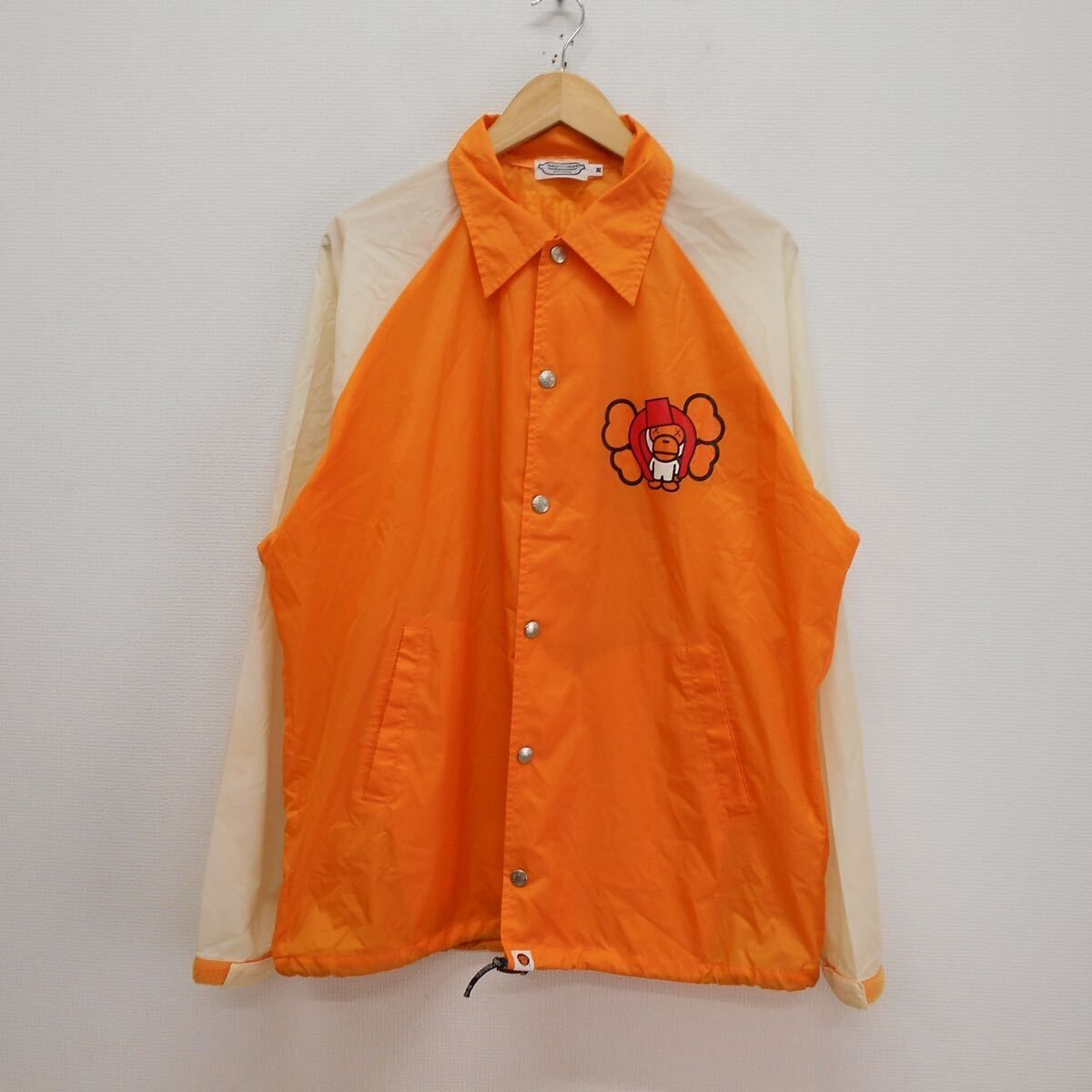 APE × KAWS baby milo ナイロン コーチジャケット/M APE × KAWS baby milo ナイロン コーチジャケット/M - メルカリ