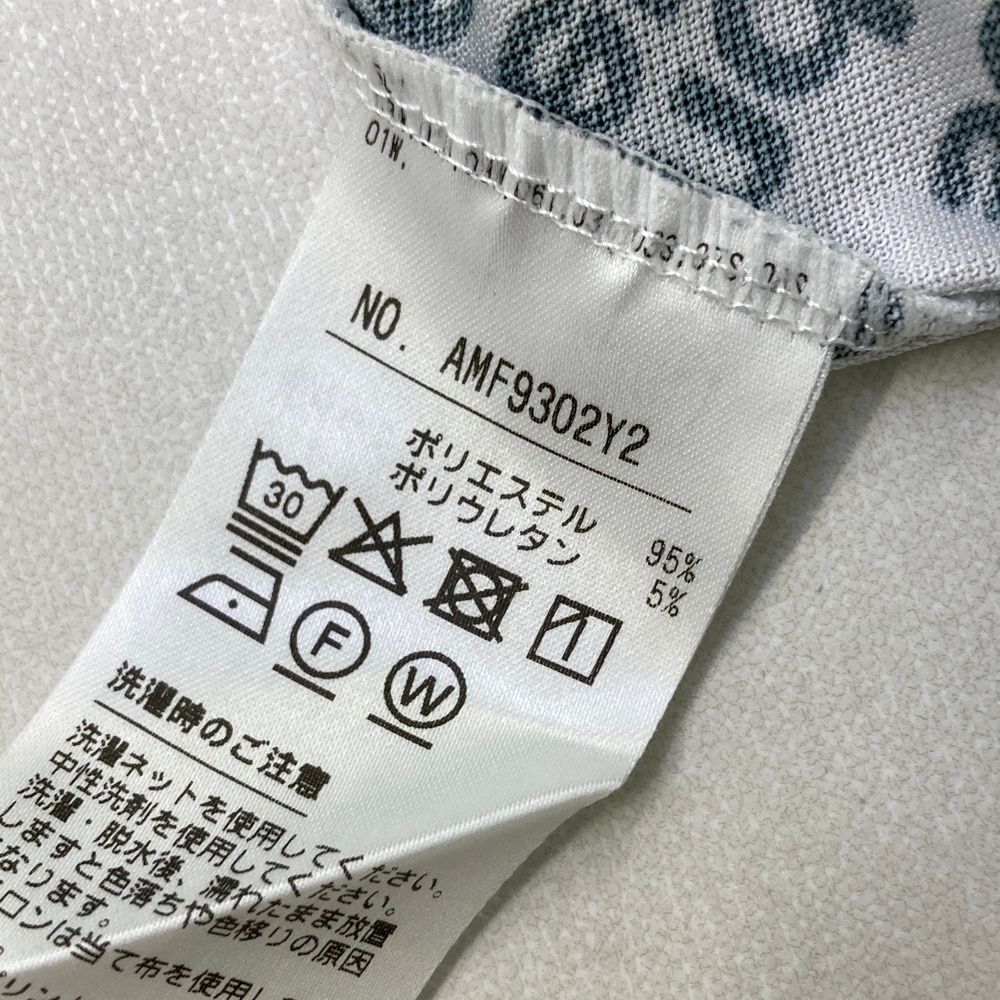 サイズ：M AND PER SE アンパスィ  長袖ポロシャツ ボタンダウン ロゴ総柄 ホワイト系 [240101472493] ゴルフウェア メンズ ストスト サイズ：M AND PER SE アンパスィ 長袖ポロシャツ ボタンダウン