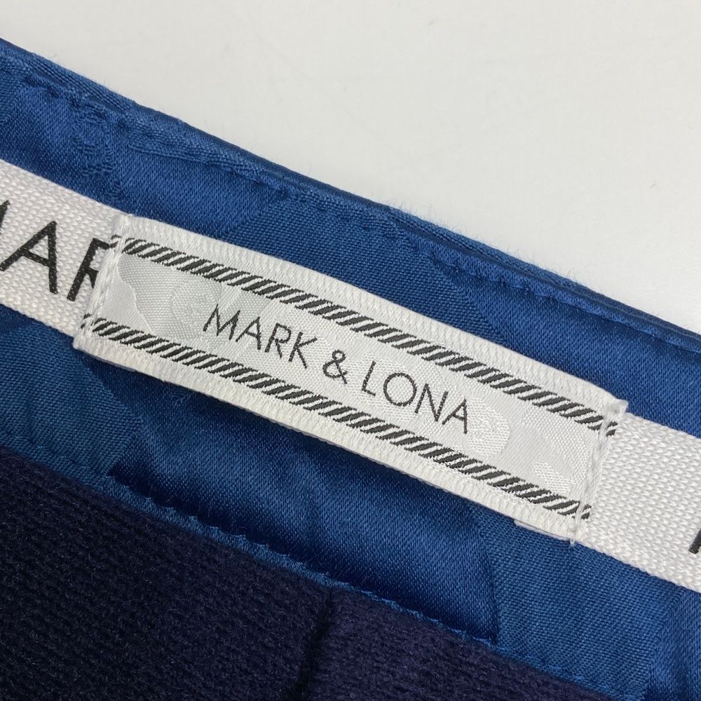 人気アイテムが再入荷！ サイズ M MARK-LONA マークアンドロナ 裏起毛 ストレッチスカート スカル 総柄 ブルー系 240101523902 ゴルフウェア レディース ストスト