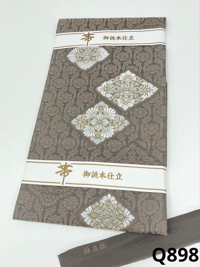 錦唐織 九寸名古屋帯 新品未使用品 菊 金糸 銀糸 正絹 - メルカリ