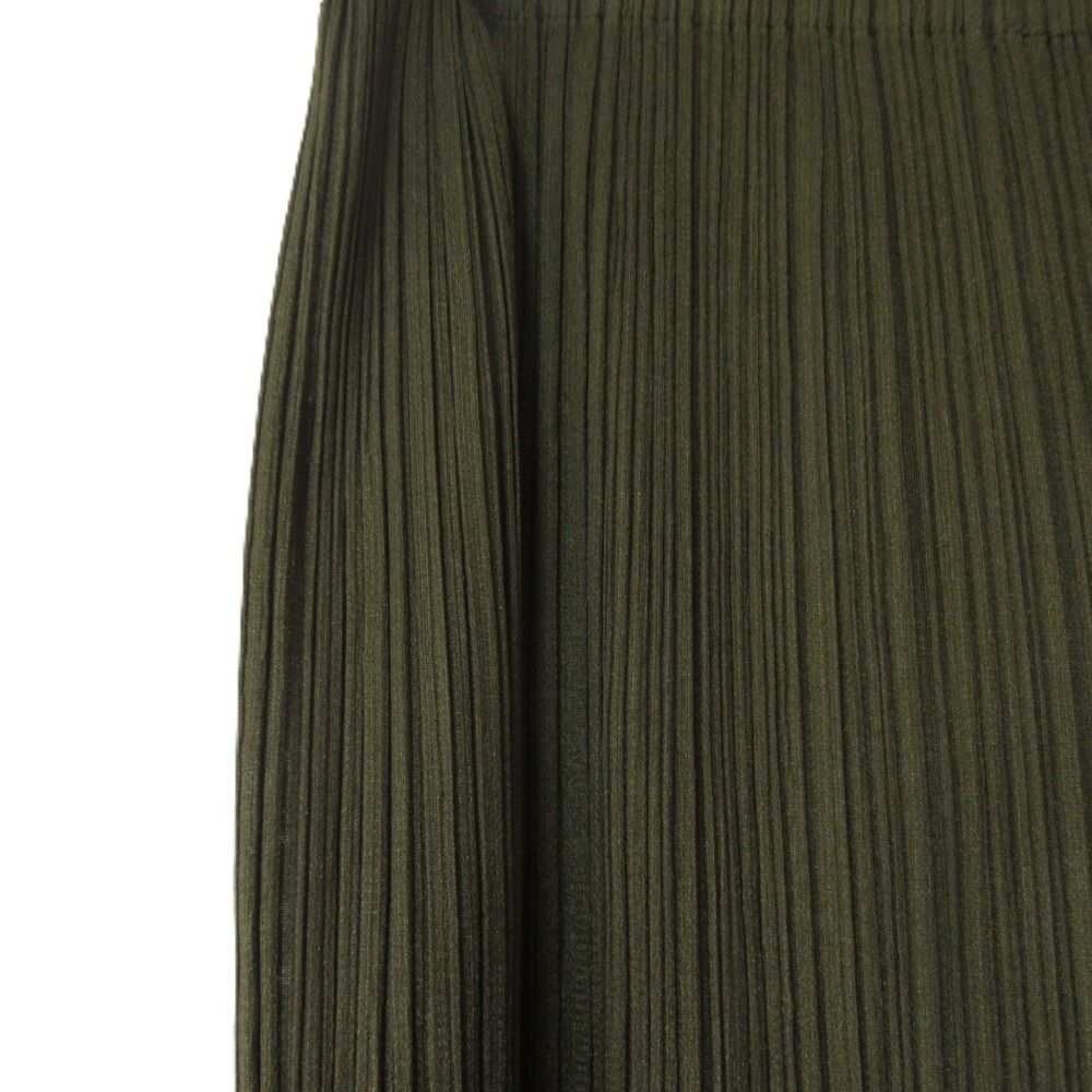 PLEATS PLEASE