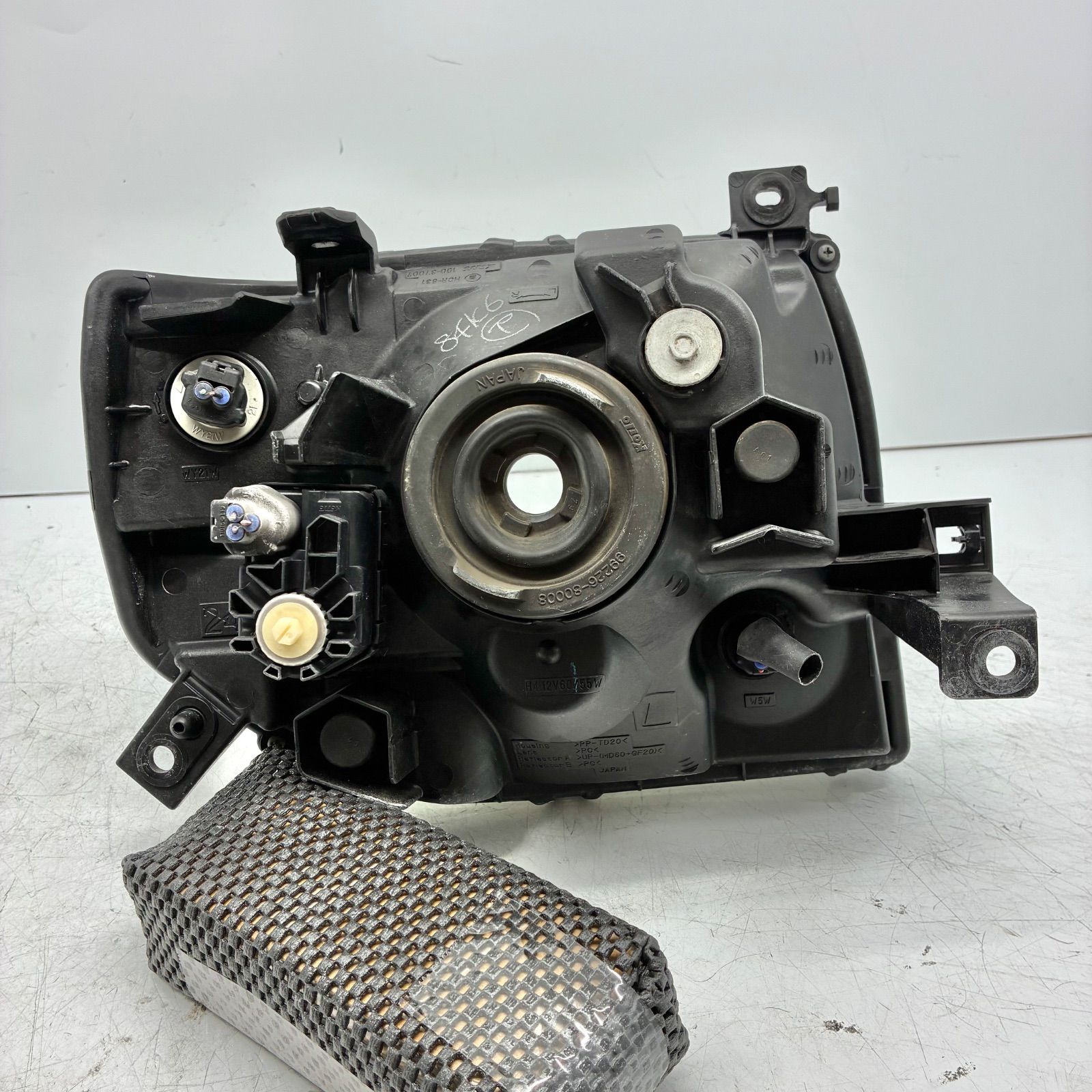 良品【コーティング済】三菱 H58A パジェロミニ 後期 ヘッドライト