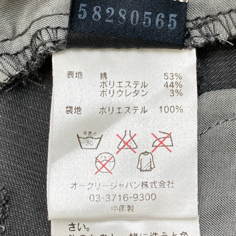 サイズ：33 OAKLEY オークリー  ストレッチパンツ 総柄 スカル刺繍 グレー系 [240101421982] ゴルフウェア メンズ ストスト OAKLEY オークリー ストレッチパンツ スカル刺繍 チェック柄