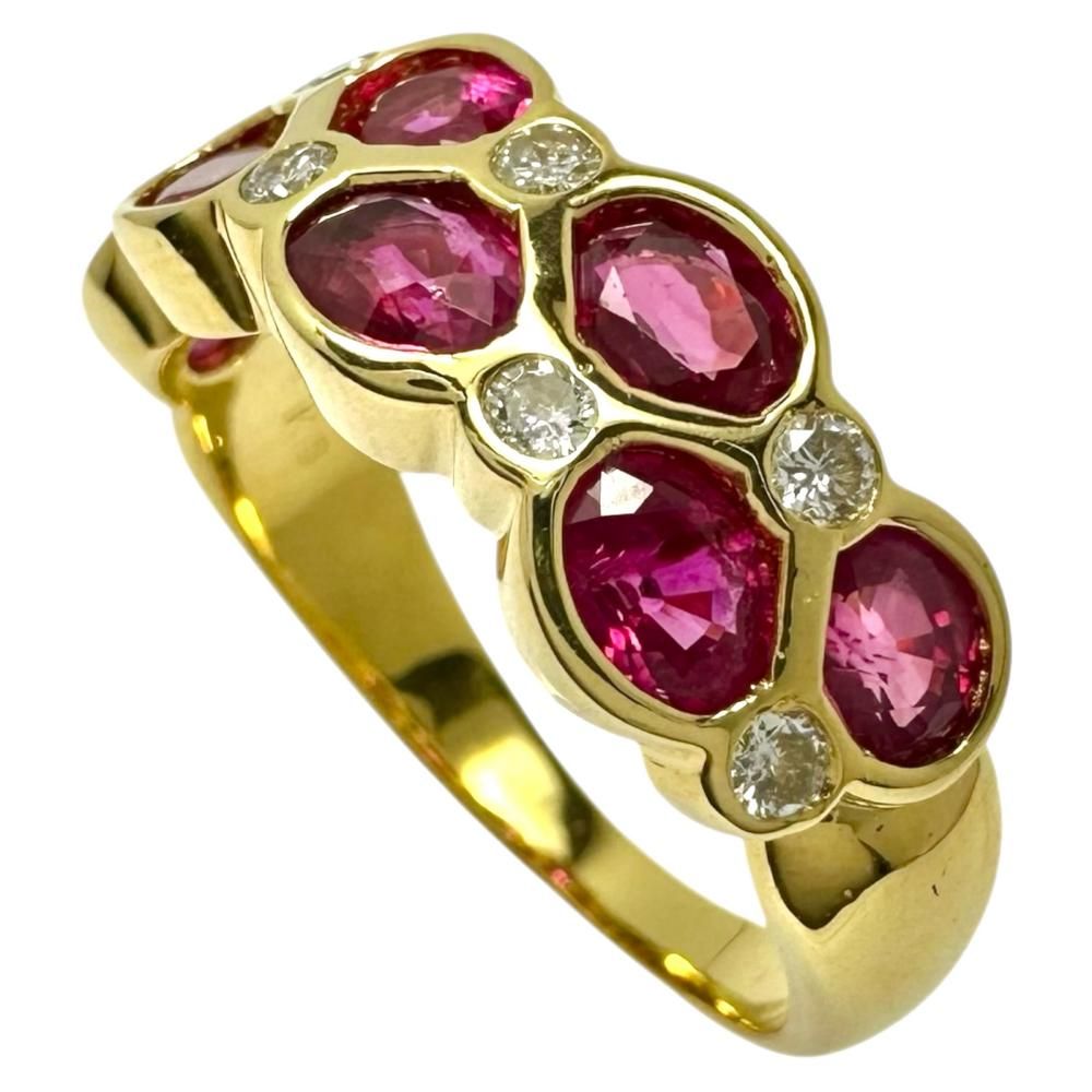 K18ゴールド ルビーとダイヤモンドの ツイストリング１１号くらい K18ゴールド ルビーとダイヤモンドの ツイストリング11号くらい K18