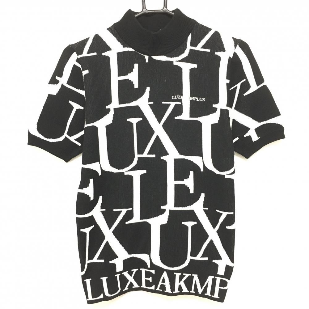 リュクスエイケイエムプラス 半袖ハイネックセーター 黒×白 英字総柄 メンズ S ゴルフウェア 2025年モデル LUXEAKMPLUS