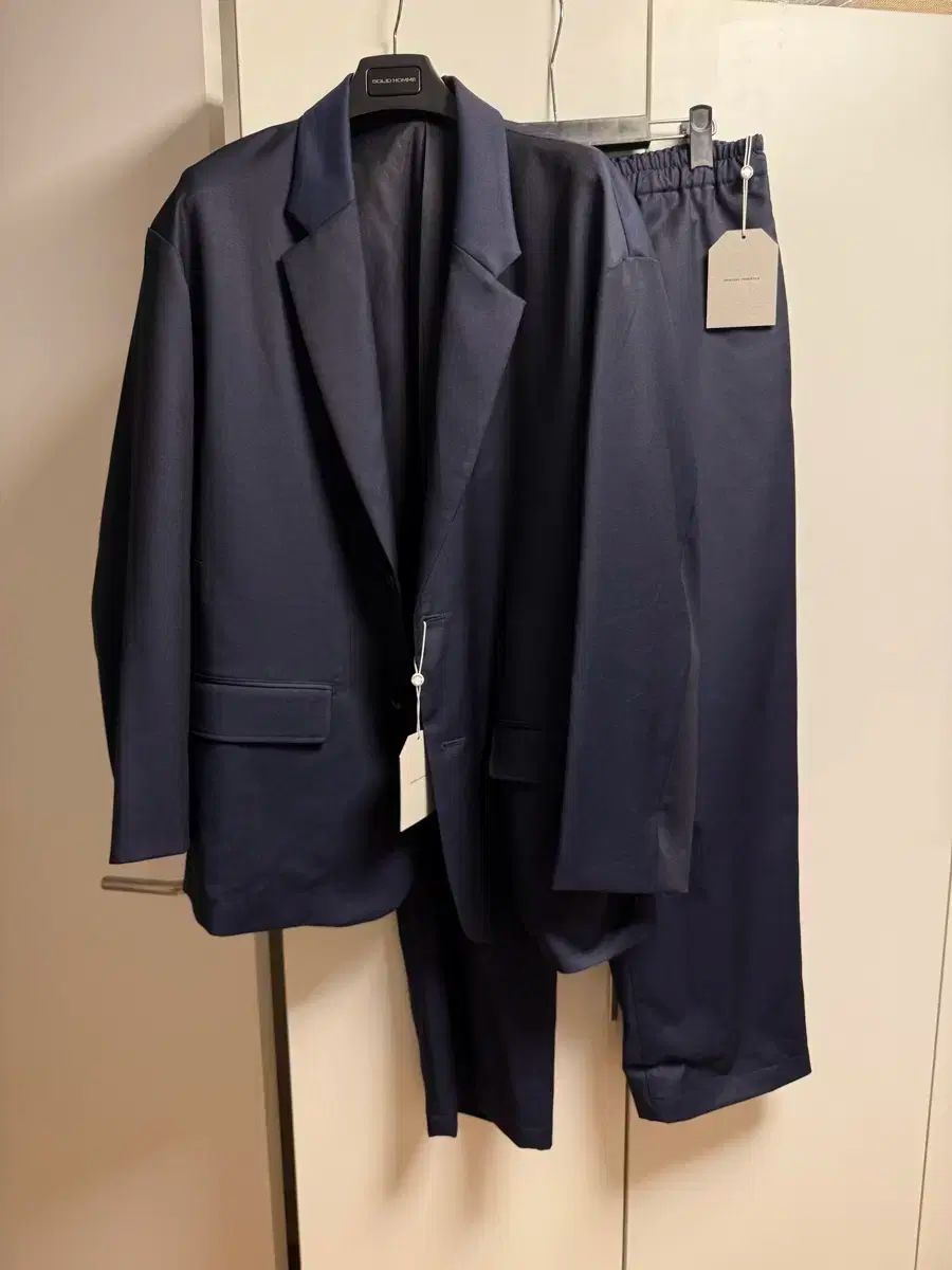 ユニバーサル製品 ネイビー セットアップ スーツ UNIVERSAL LANGUAGE