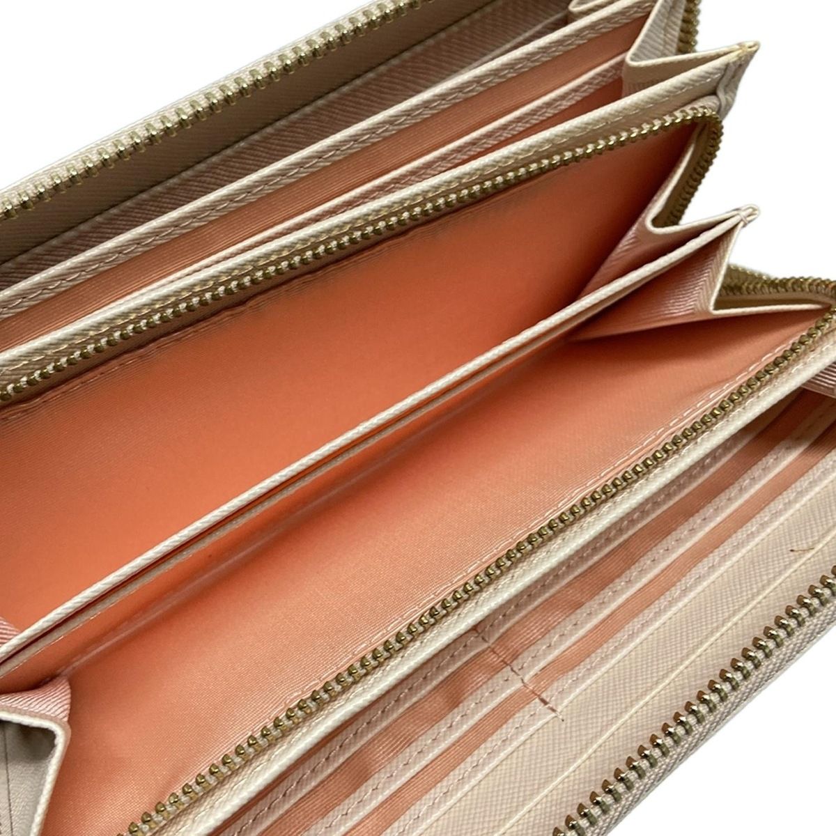 ライトピンク ラウンドファスナー