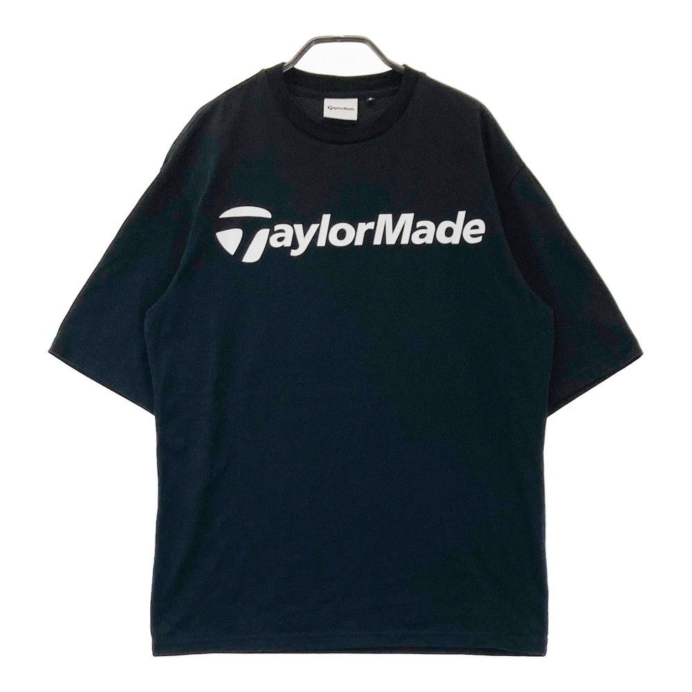 サイズ：M TAYLOR MADE テーラーメイド 2024年 半袖Tシャツ  ブラック系 [240101447307] ゴルフウェア メンズ ストスト サイズ：M TAYLOR MADE テーラーメイド 2024年 半袖Tシャツ