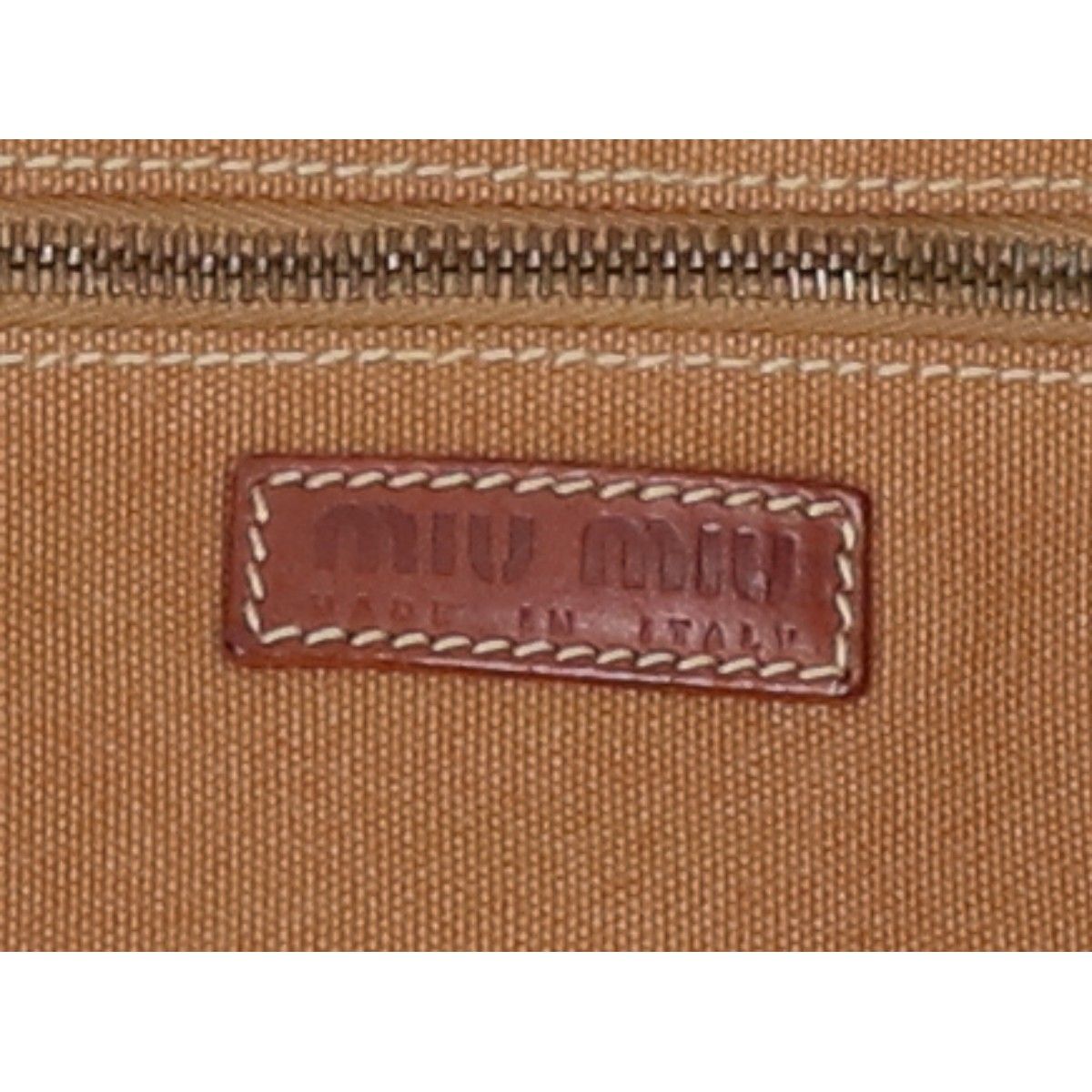 MIUMIU ミュウミュウ ロゴ入り キャンバス - メルカリ