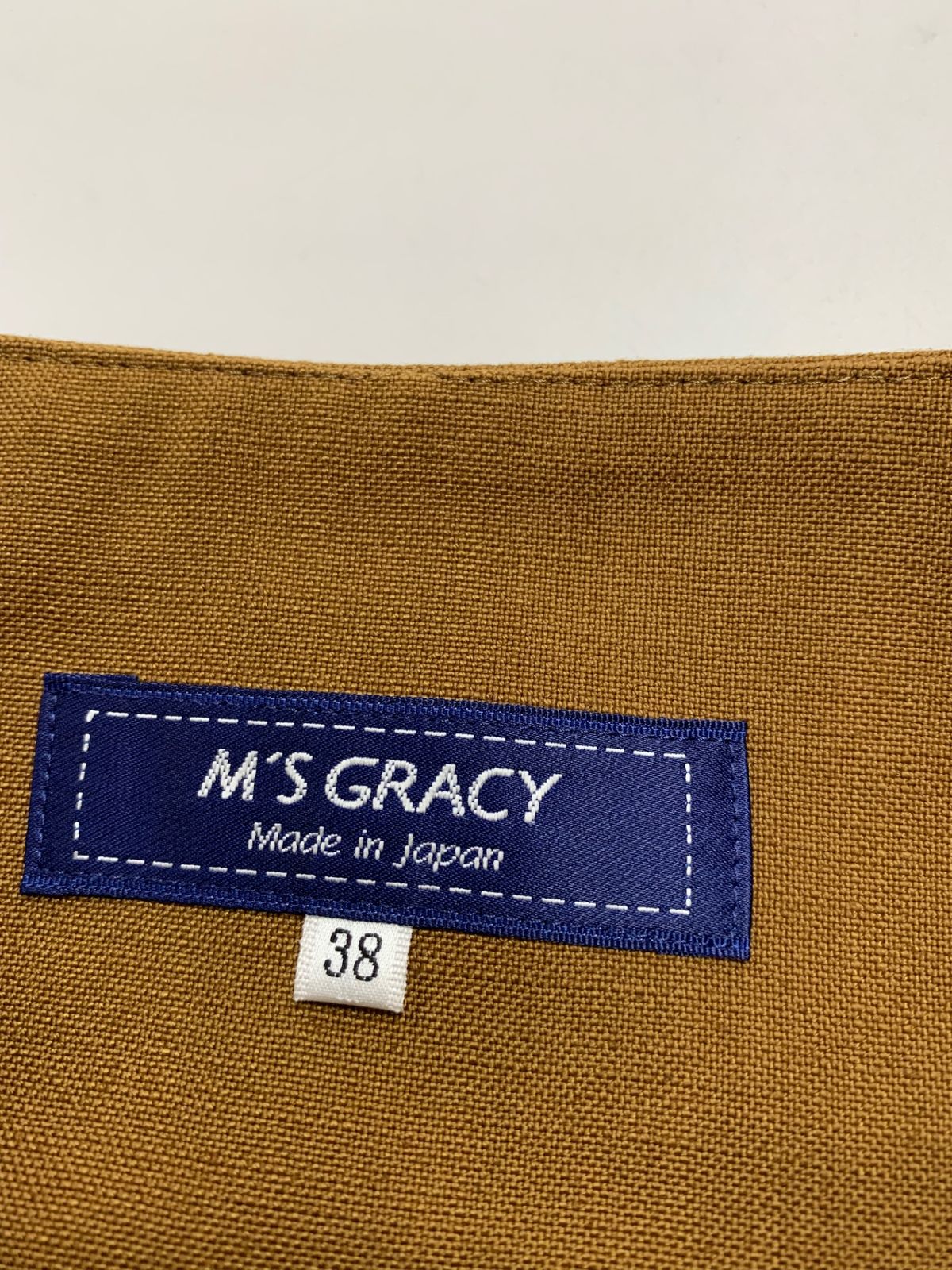 エムズグレイシー 花ボタン付きフ ー 517325 スカート 38 ブラウン ITLRVQKYDU90 SIROKUMA-CORPORATION_COM