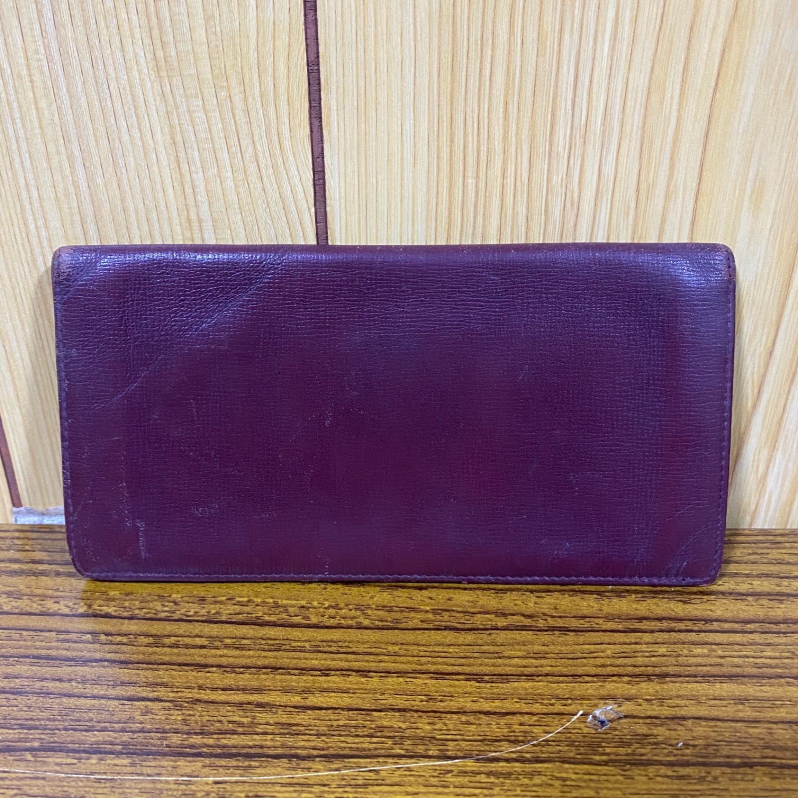 55 cartier カルティエ 二つ折り財布 マストライン レザー ボルドー系
