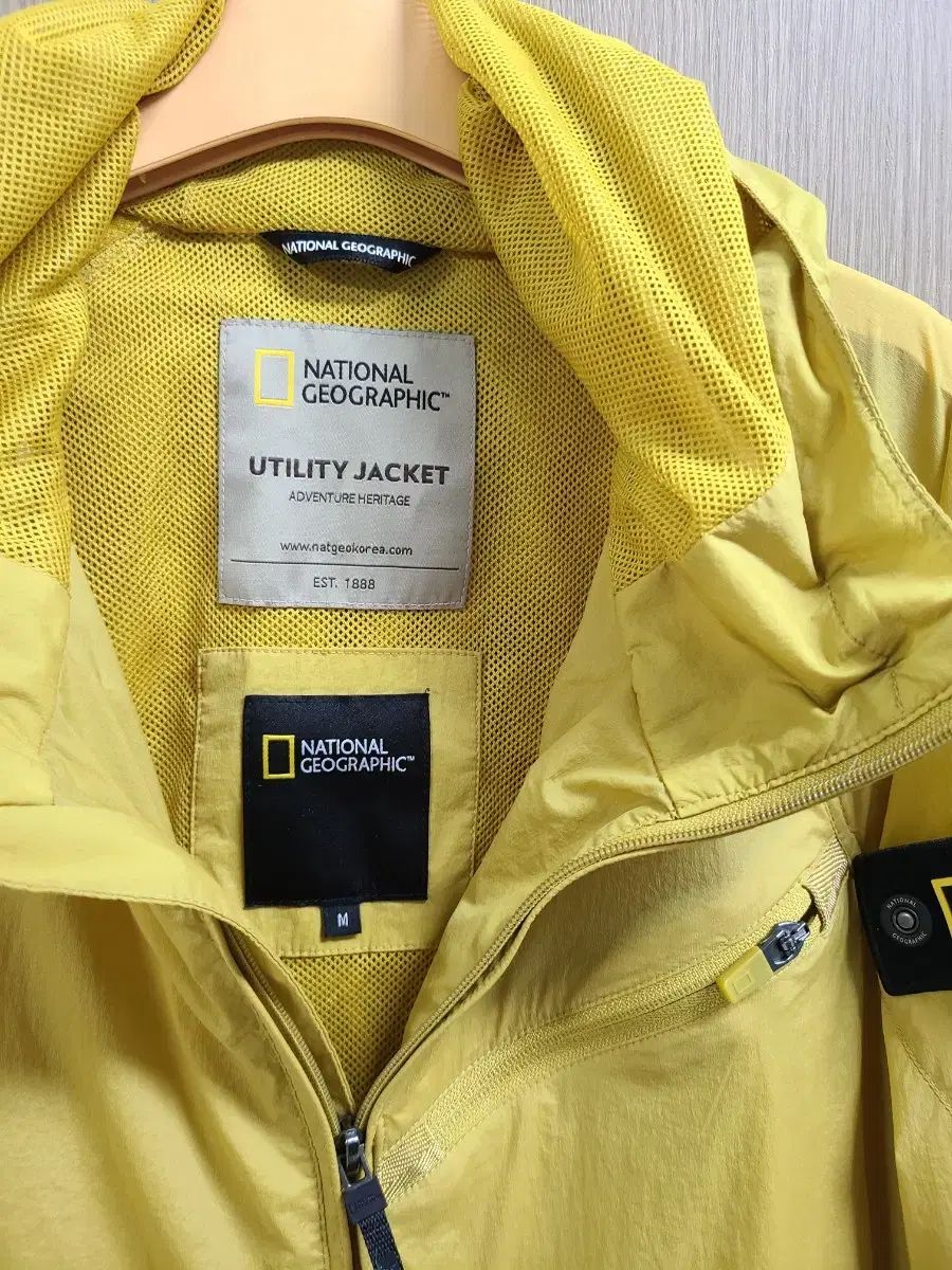 ナショナルジオグラフィック イェロー ウィンドブレーカー フード ジャケット