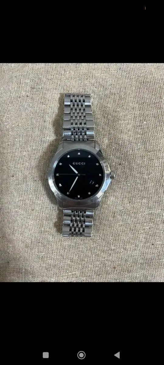 本物 グッチ ラウンド 12P ダイヤ 時計 38mm ユニセックス