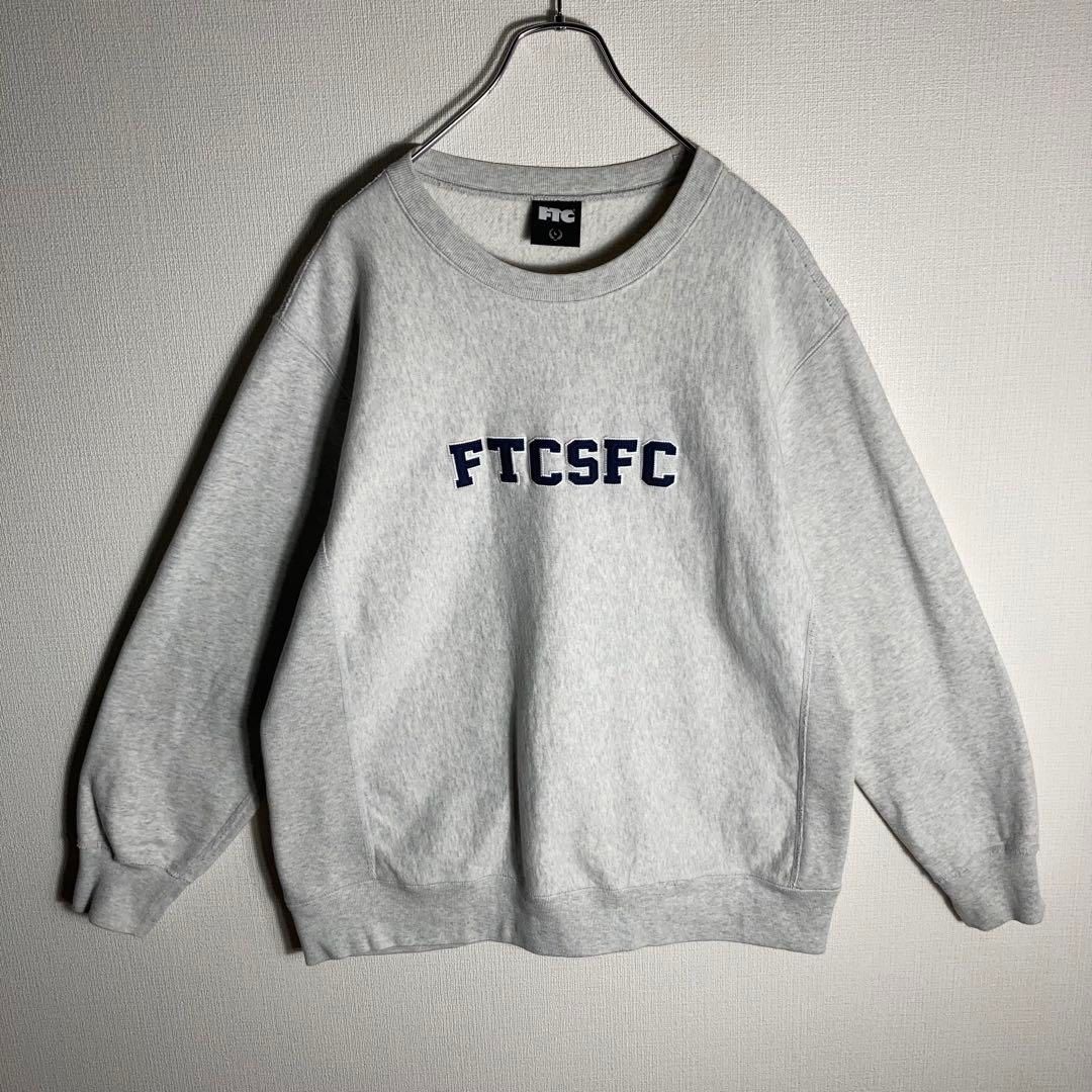 FTC グレー スウェット FTC（エフティーシー）の「SMALL BOX LOGO CREW NECK