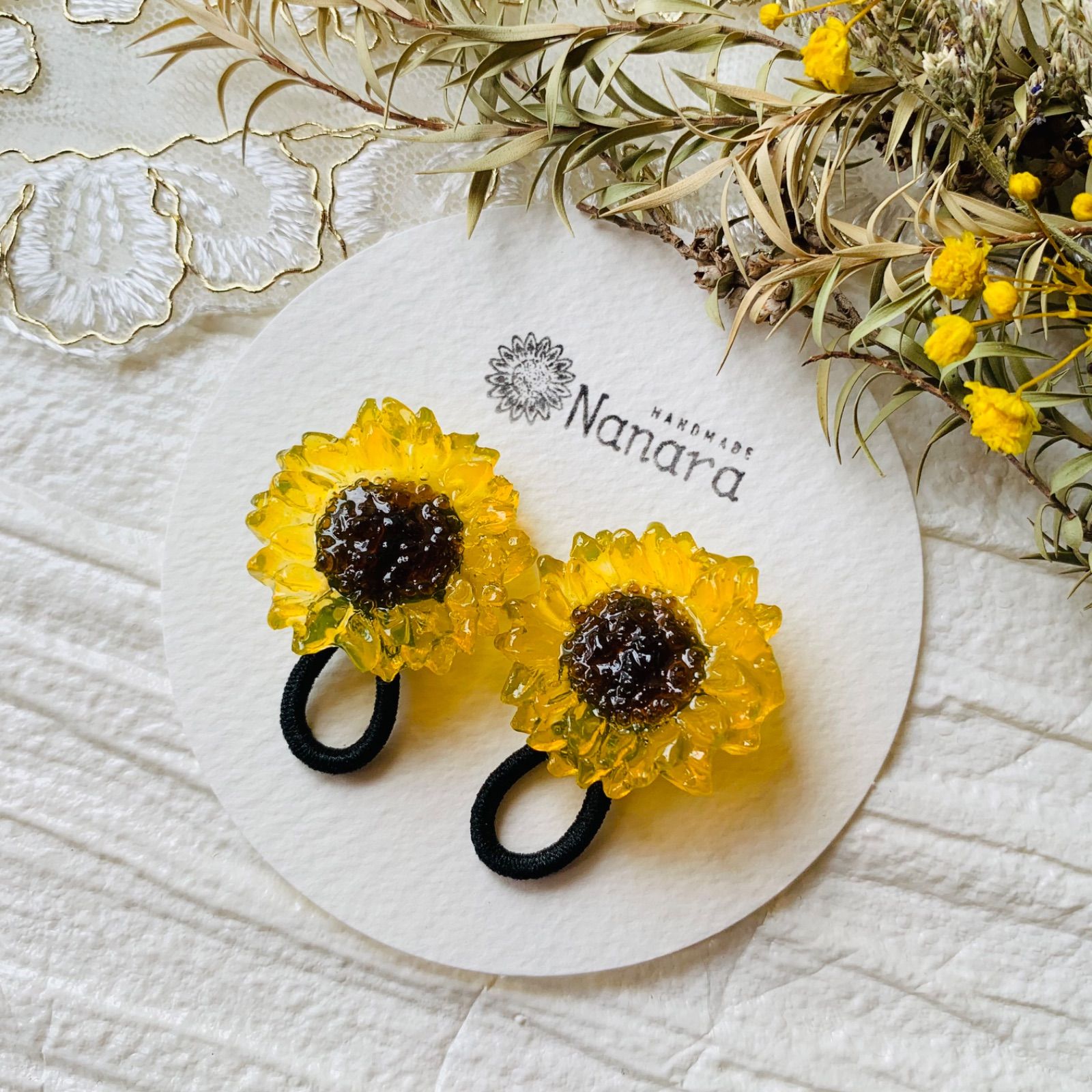 ひまわりヘアゴム🌻2点セット - メルカリ