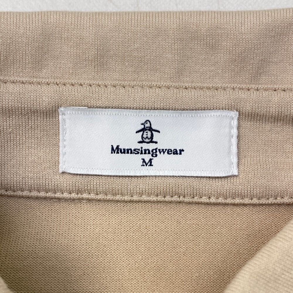 サイズ：M MUNSING WEAR マンシングウェア  長袖ポロシャツ ロゴ刺繍  ベージュ系 [240101427109] ゴルフウェア レディース ストスト MUNSING WEAR マンシングウェア 長袖ポロシャツ ロゴ刺繍