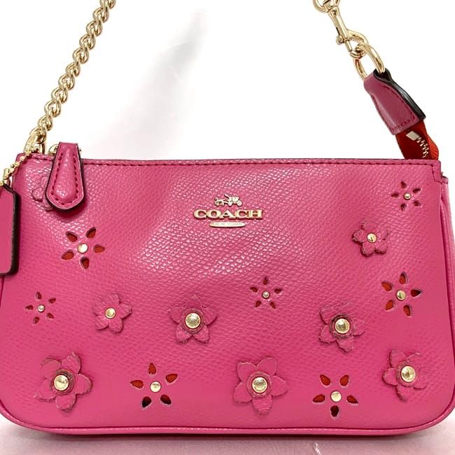バッグ Coach Leather Pink Accessory Pouch Bag Coach Pink PVC Leather Accessory Pouch with Studs and Floral