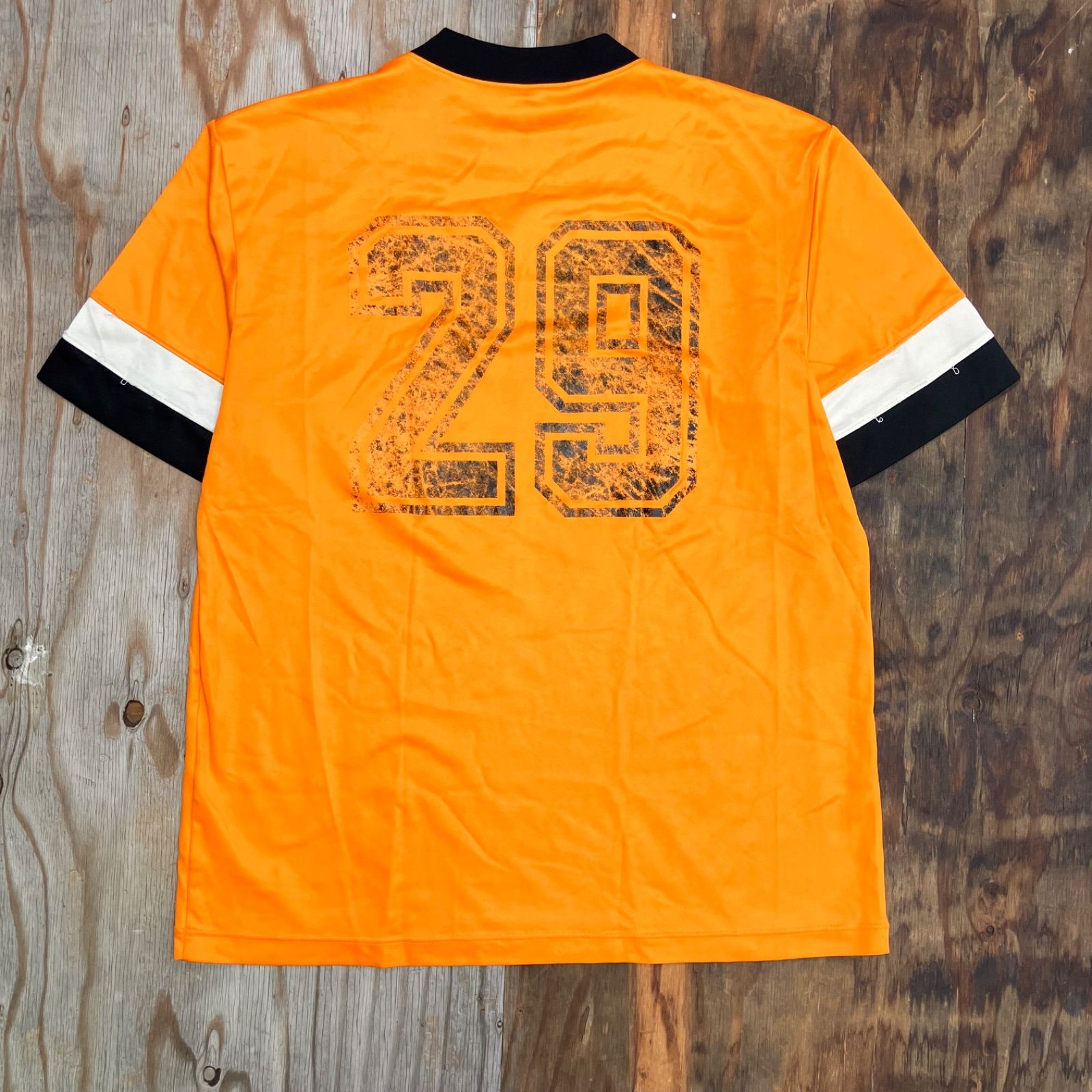 le coq sportif ルコックスポルティフ ゲームシャツ Vネック オレンジ