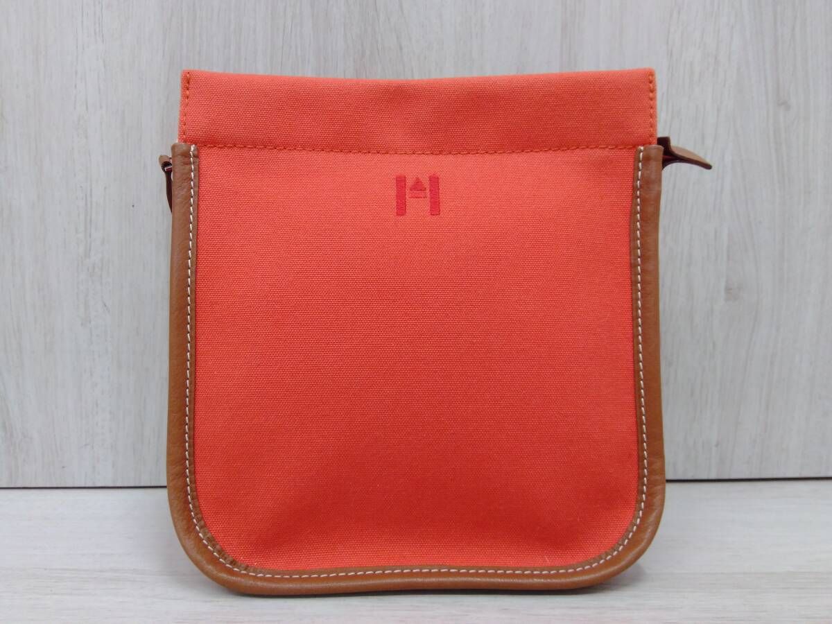 HERMES エルメス ポーチ オレンジ 【公式通販】