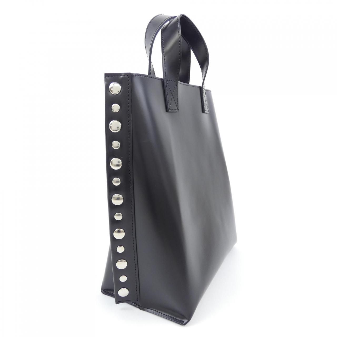 タオコムデギャルソン