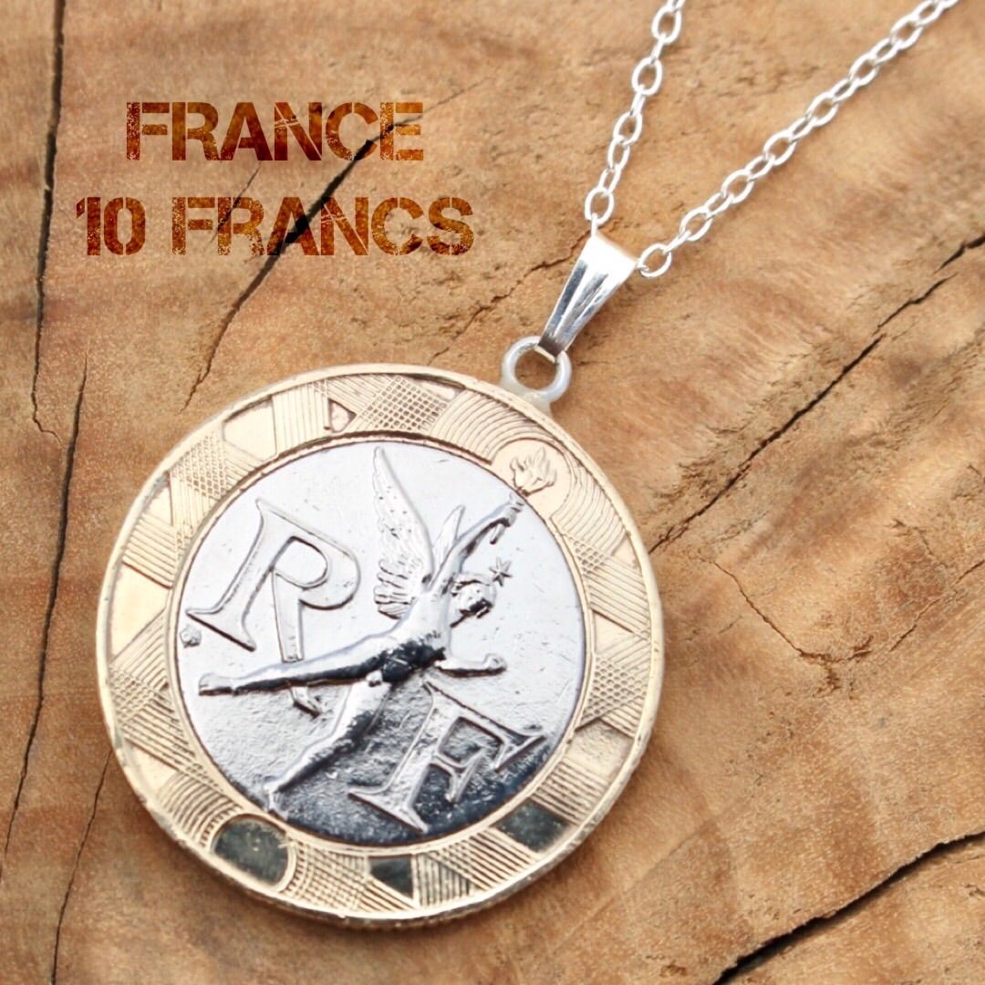 10フラン バイメタル フランス コイン ペンダント - メルカリ