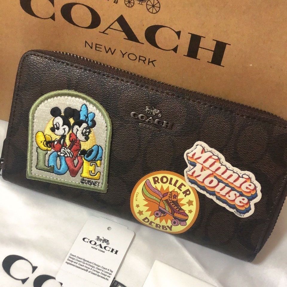 オモウマい店 コーチ COACH❤️ディズニーコラボ長財布 シグネチャー