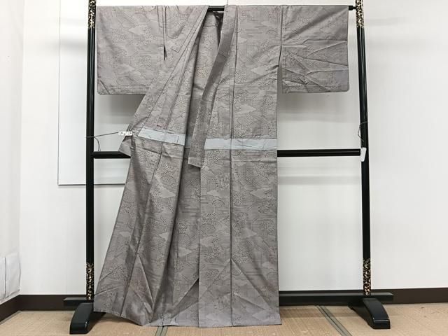 平和屋着物▽本場大島紬 草木色泥染 単衣 風景花文 大山謹製 証紙付き