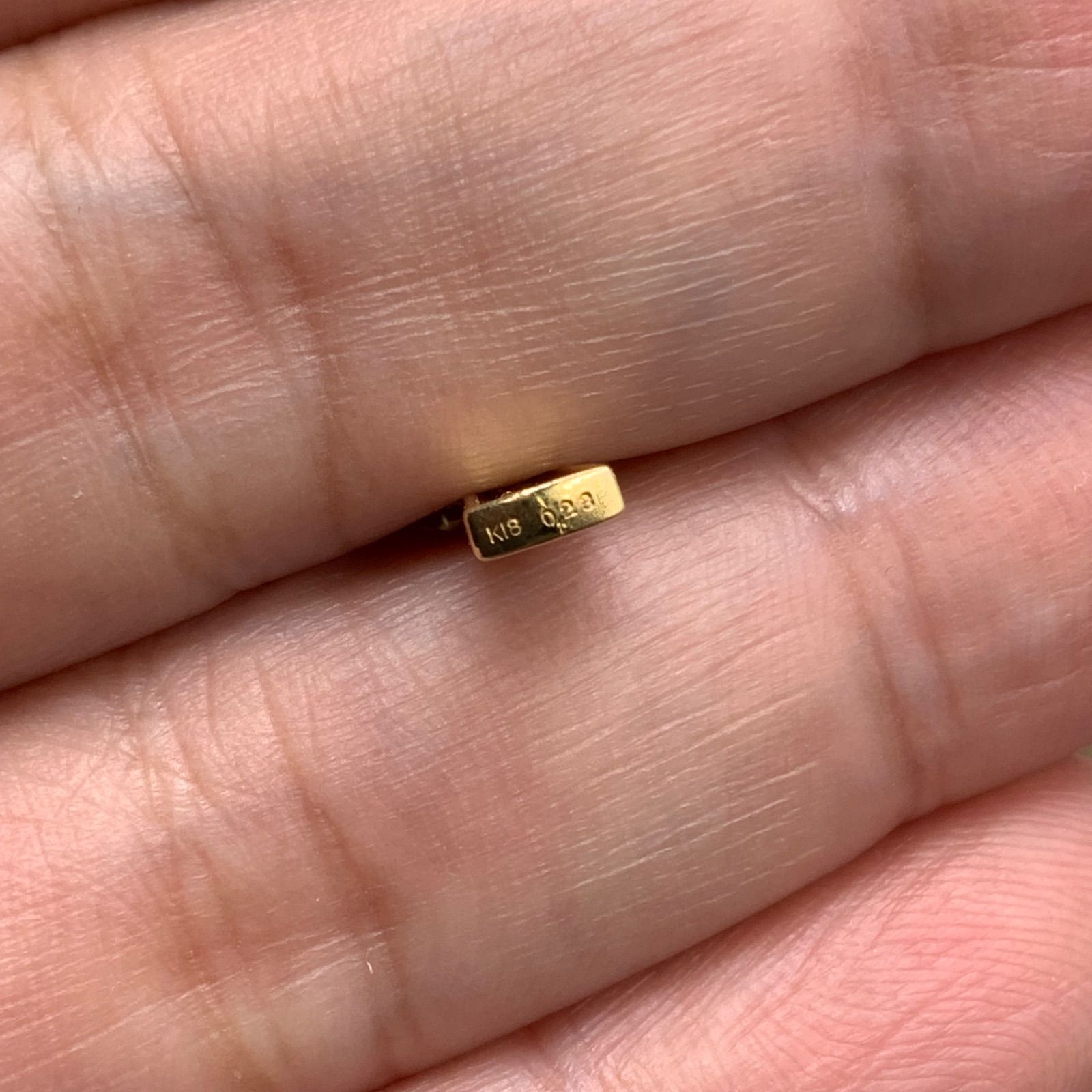 K18 ダイヤ クロス ペンダント 3.8g 0.23ct - メルカリ