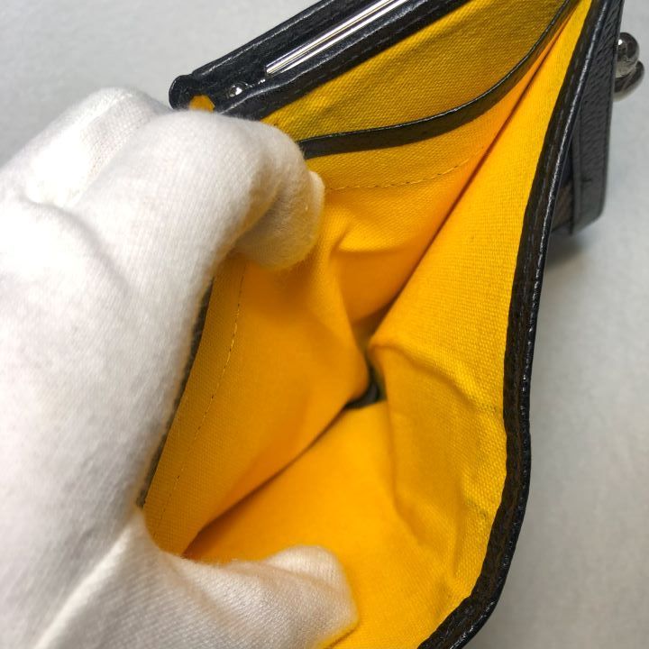 新品未使用品　Vivienne Westwood がま口 二つ折り イエロー黄 Vivienne Westwood ヴィヴィアンウエストウッド 二つ折り財布