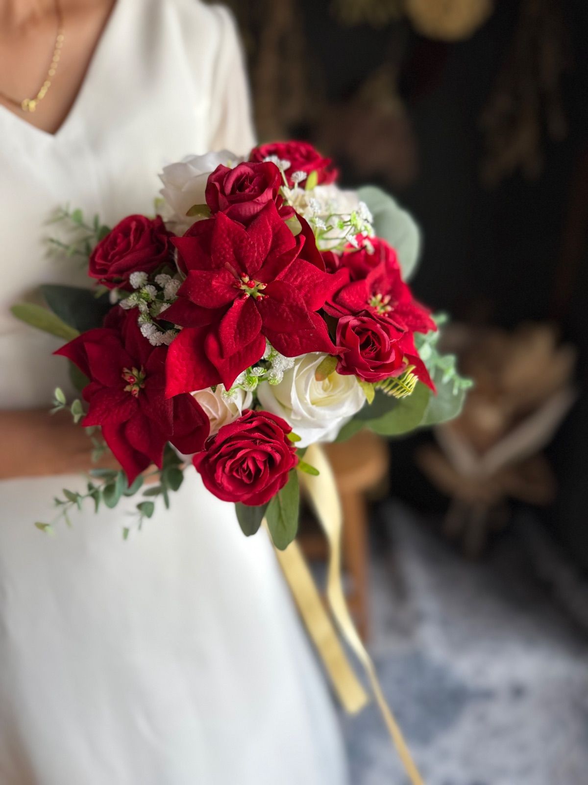 ポインセチアクラッチブーケ ブートニア