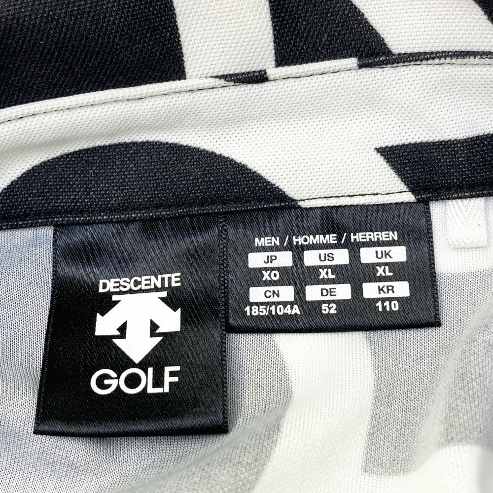 サイズ：XO DESCENTE GOLF デサントゴルフ  半袖ポロシャツ 総柄 ブラック系 [240101368459] ゴルフウェア メンズ ストスト サイズ：XO DESCENTE GOLF デサントゴルフ 半袖ポロシャツ 総柄