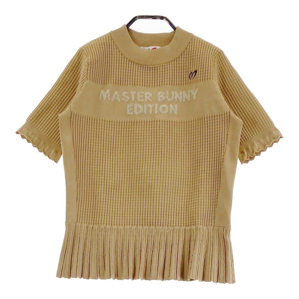 サイズ：1 MASTER BUNNY EDITION マスターバニーエディション ;2023年モデル ハイネック 半袖ニット ロゴ  ベージュ系 [240101466939] ゴルフウェア レディース ストスト サイズ：1 MASTER BUNNY EDITION マスターバニーエディション