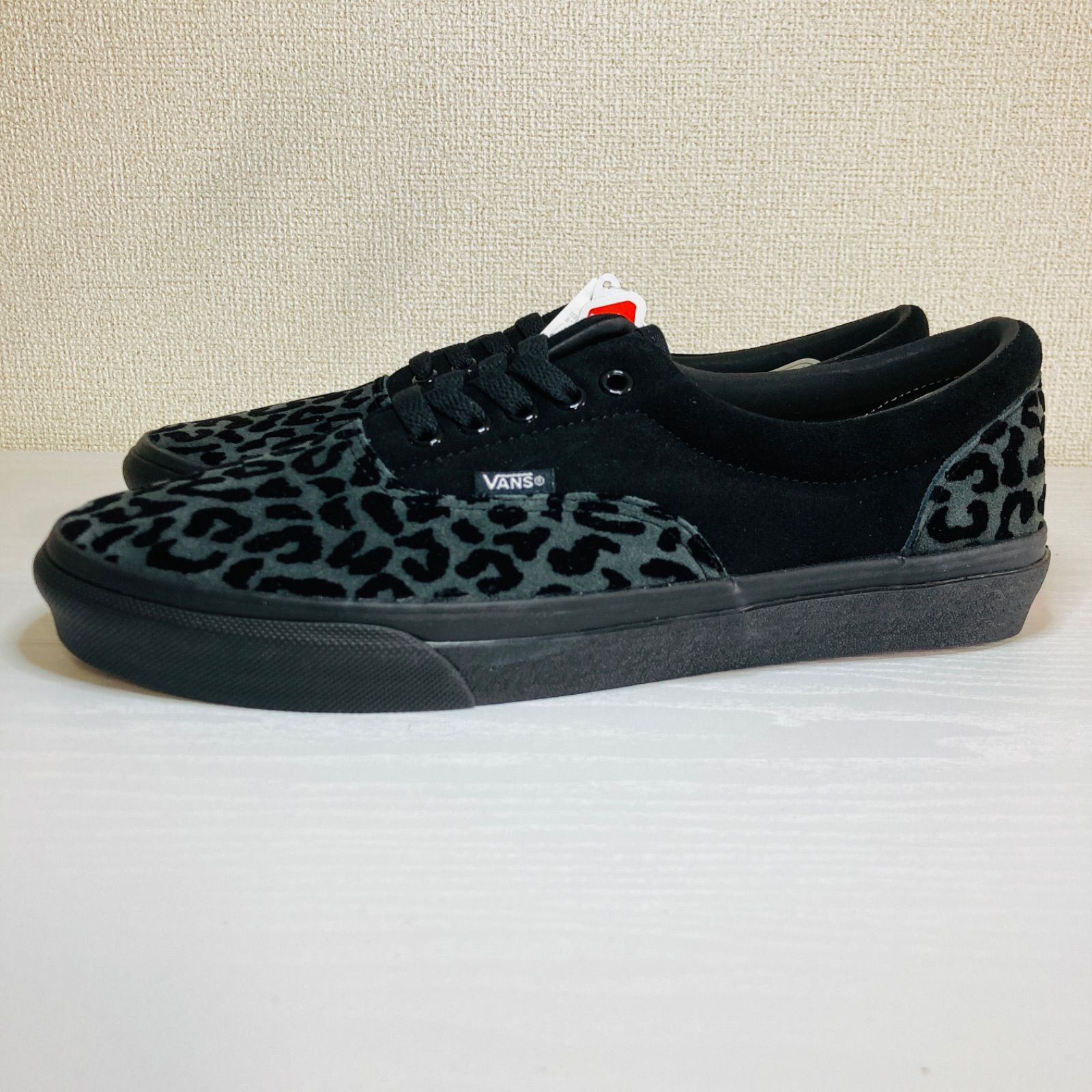 Vans era deals black leopard