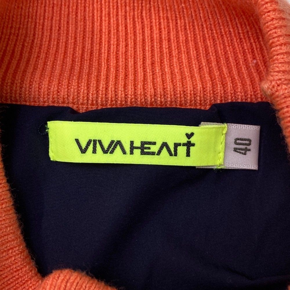 サイズ：40 VIVA HEART ビバハート  裏地付 ハイネック ニットセーター  オレンジ系 [240101449726] ゴルフウェア レディース ストスト サイズ：40 VIVA HEART ビバハート 裏地付 ハイネック ニット