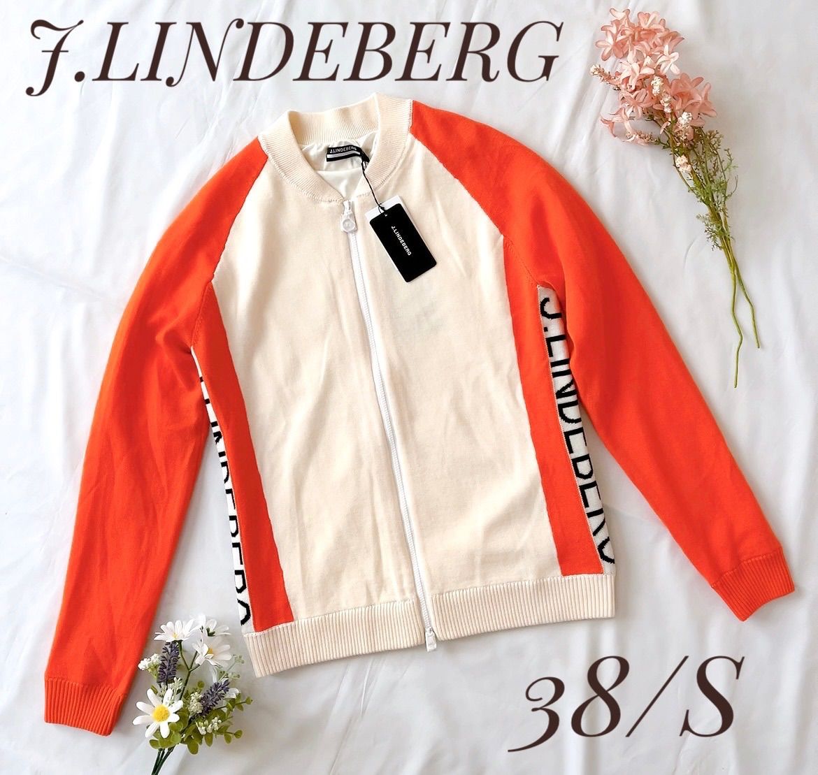 クリスマスセール中 25日まで！ 新品 J.LINDEBERG ジェイ、リンドバーグ（レディース）ゴルフウェア ジャケット アウター サイドロゴ  ニットブルゾン Sサイズ 定価 41800円 - 在庫