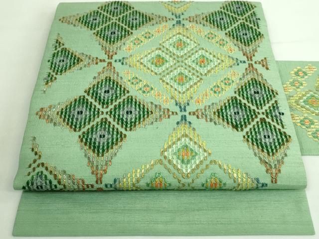 平和屋着物□極上 本場琉球 読谷山花織 紬地 九寸名古屋帯 柳染色地  