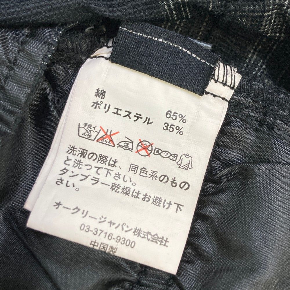 サイズ：36 OAKLEY オークリー 421828JP ロングパンツ スカル刺繍 チェック柄 グレー系 [240101421267] ゴルフウェア メンズ ストスト サイズ：36 OAKLEY オークリー 421828JP ロングパンツ スカル