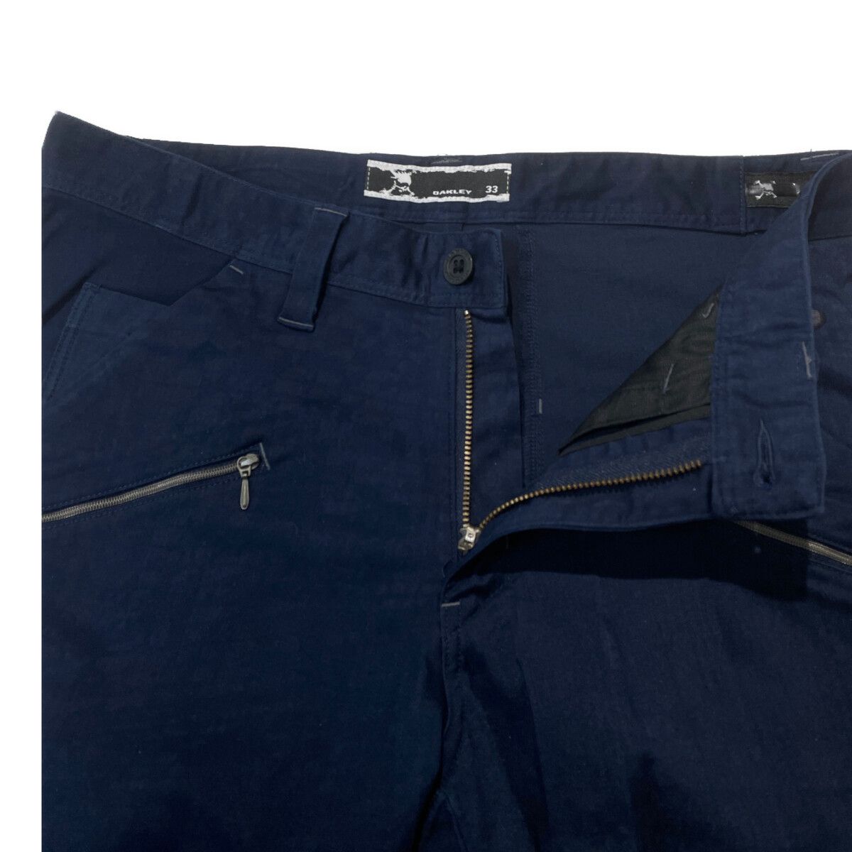 サイズ：33 OAKLEY オークリー ストレッチパンツ 総柄 スカル