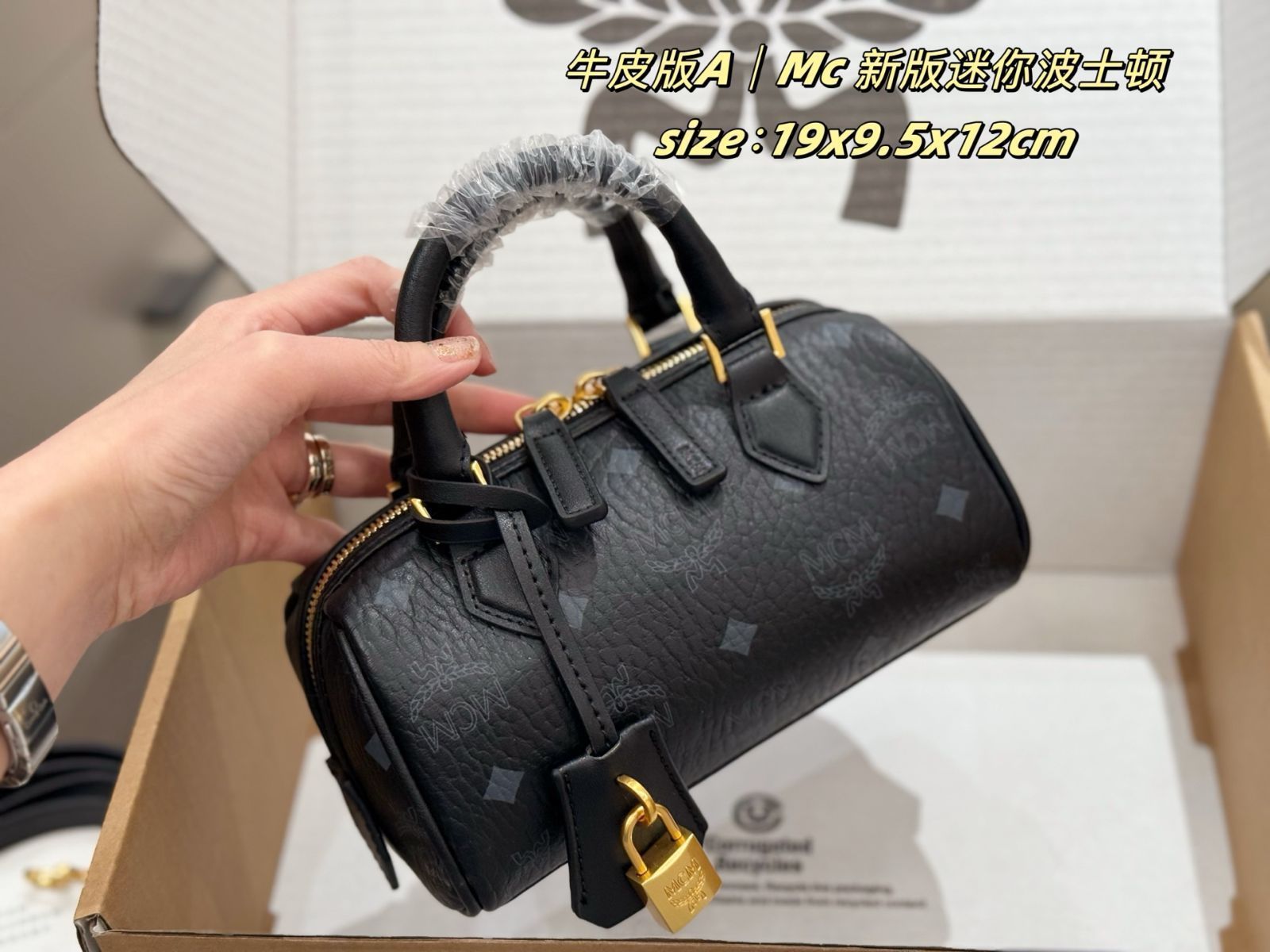 MCM 新モデルのロックボストンバッグ - メルカリ