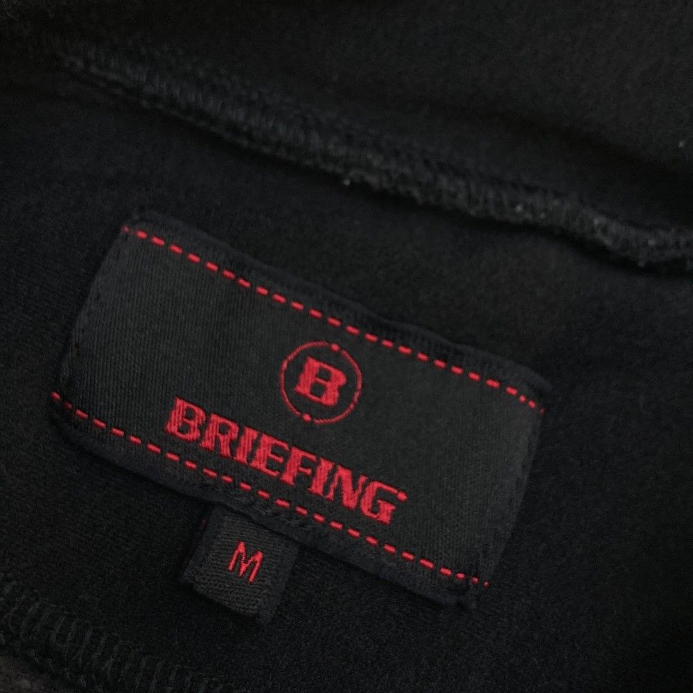 サイズ：M BRIEFING GOLF ブリーフィング  長袖ハイネックTシャツ  ブラック系 [240101466555] ゴルフウェア メンズ ストスト サイズ：M BRIEFING GOLF ブリーフィング 長袖ハイネックTシャツ