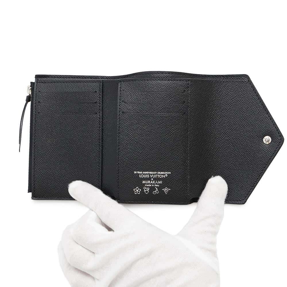 ルイヴィトン 三つ折り財布 モノグラム LV × TM ポルトフォイユ