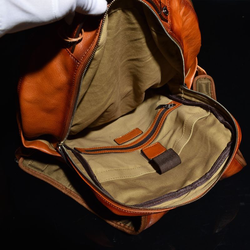 ◇ANDAKA 牛本革 あぶり系 コンチョ付き バックパック ダブルZIP
