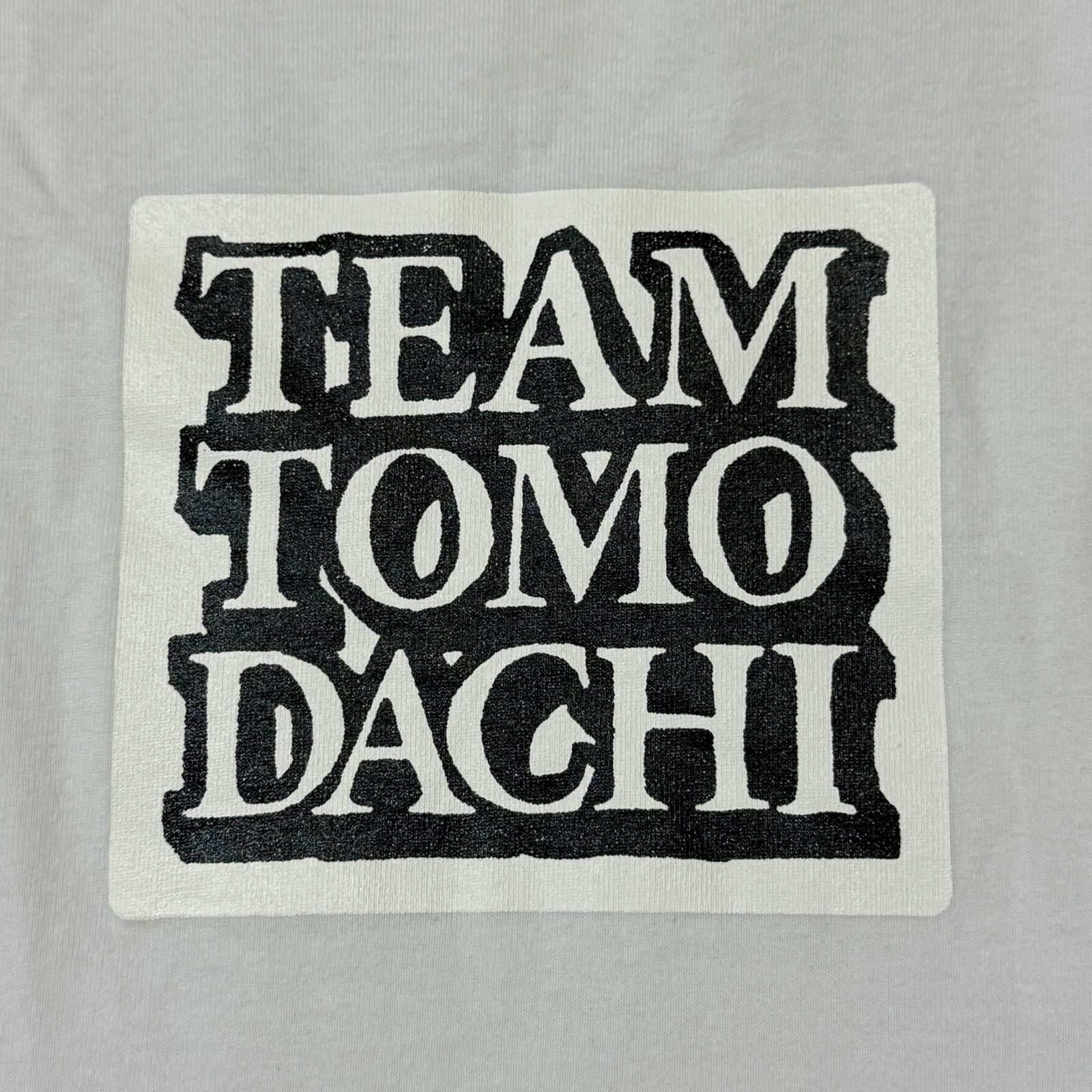 THE BLACK EYE PATCH TEAM TOMODACHI LABEL TEE チーム友達ラベルT
