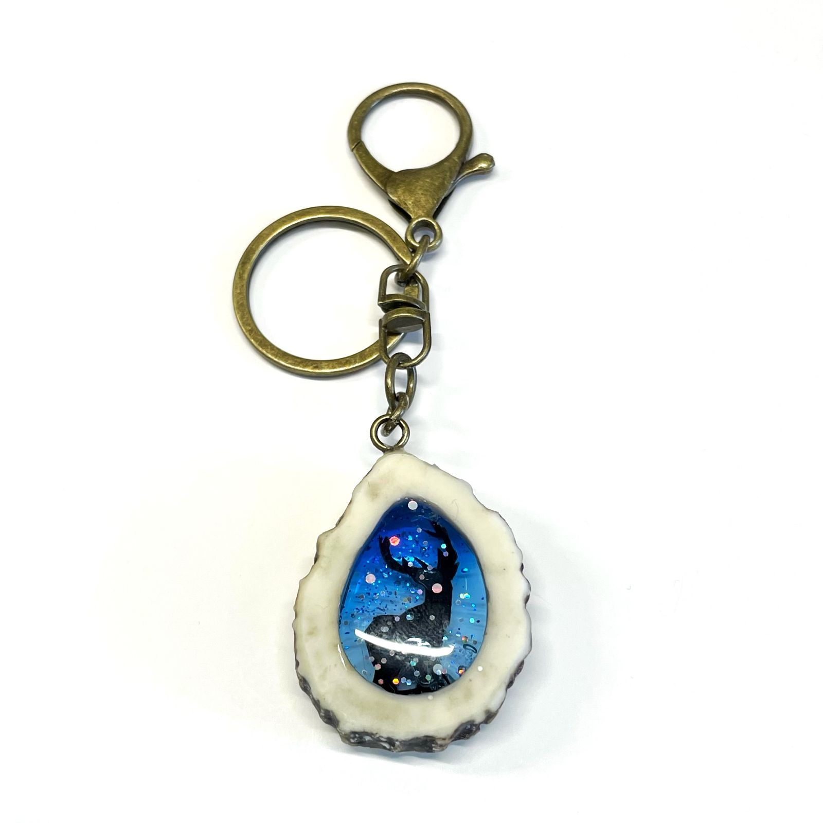 ハンドメイド】鹿角 UVレジン チャーム ストラップ - メルカリ