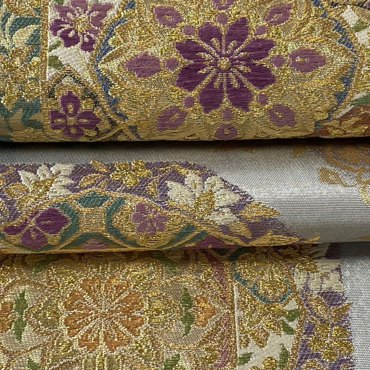 袋帯 美品 逸品 じゅらく 落款 帝王紫 華文 花唐草 金糸 箔 灰色