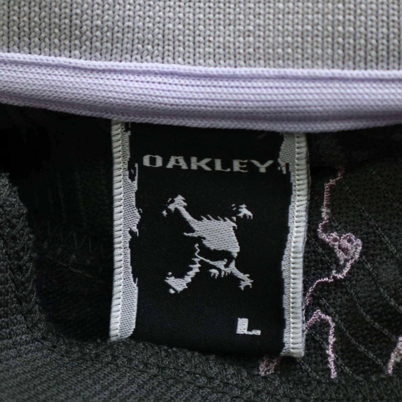 OAKLEY 刺繍　スカル　総柄　半袖　ハーフジップ　ポロシャツ OAKLEY スカルロゴ刺繍 ゴルフウェア ロゴ入り 半袖ポロシャツM