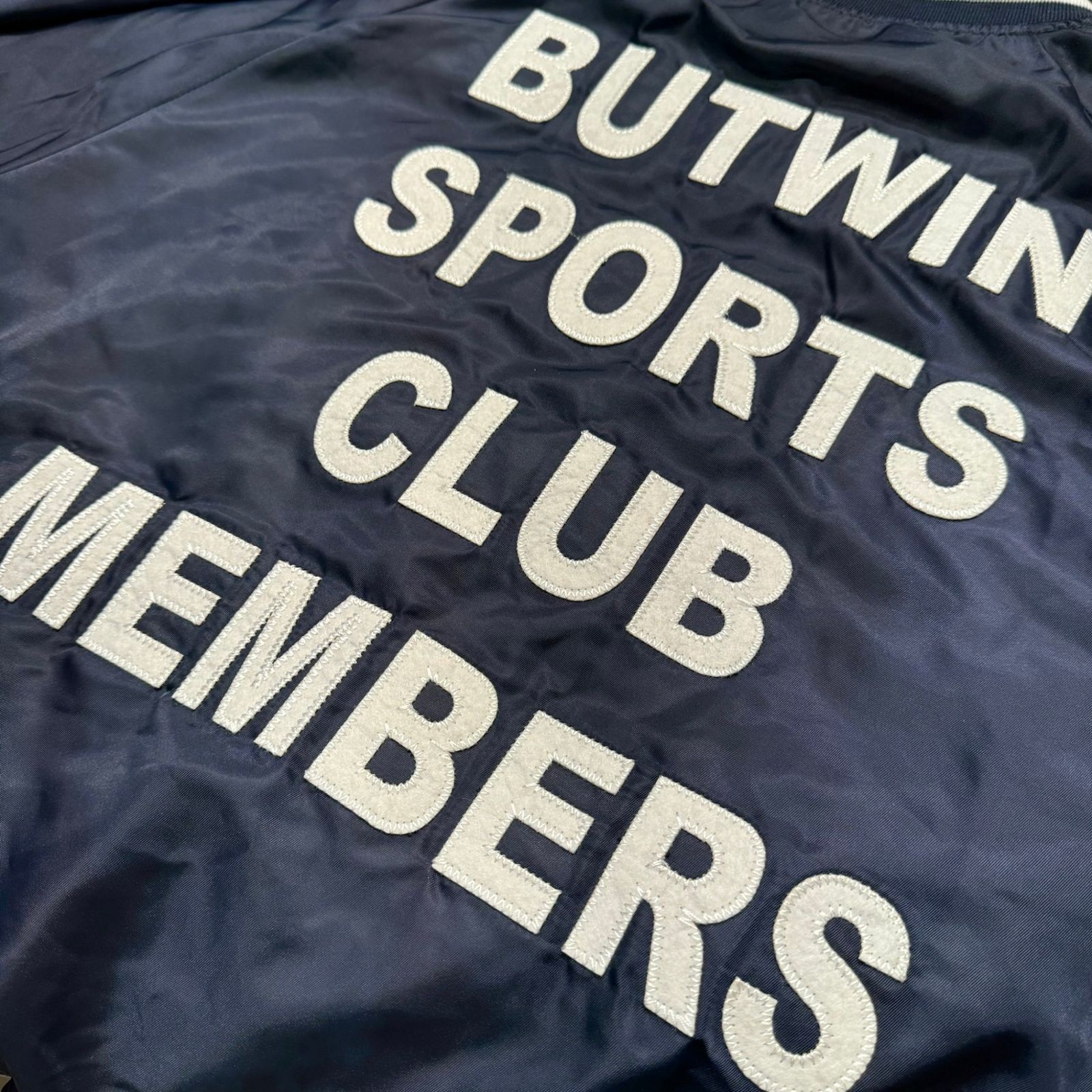 Spick - Span スピックアンドスパン ④ 24011210001310 BUTWIN ナイロンツイルスタジャン ユニセックス ネイビー M GULLKHAN_COM