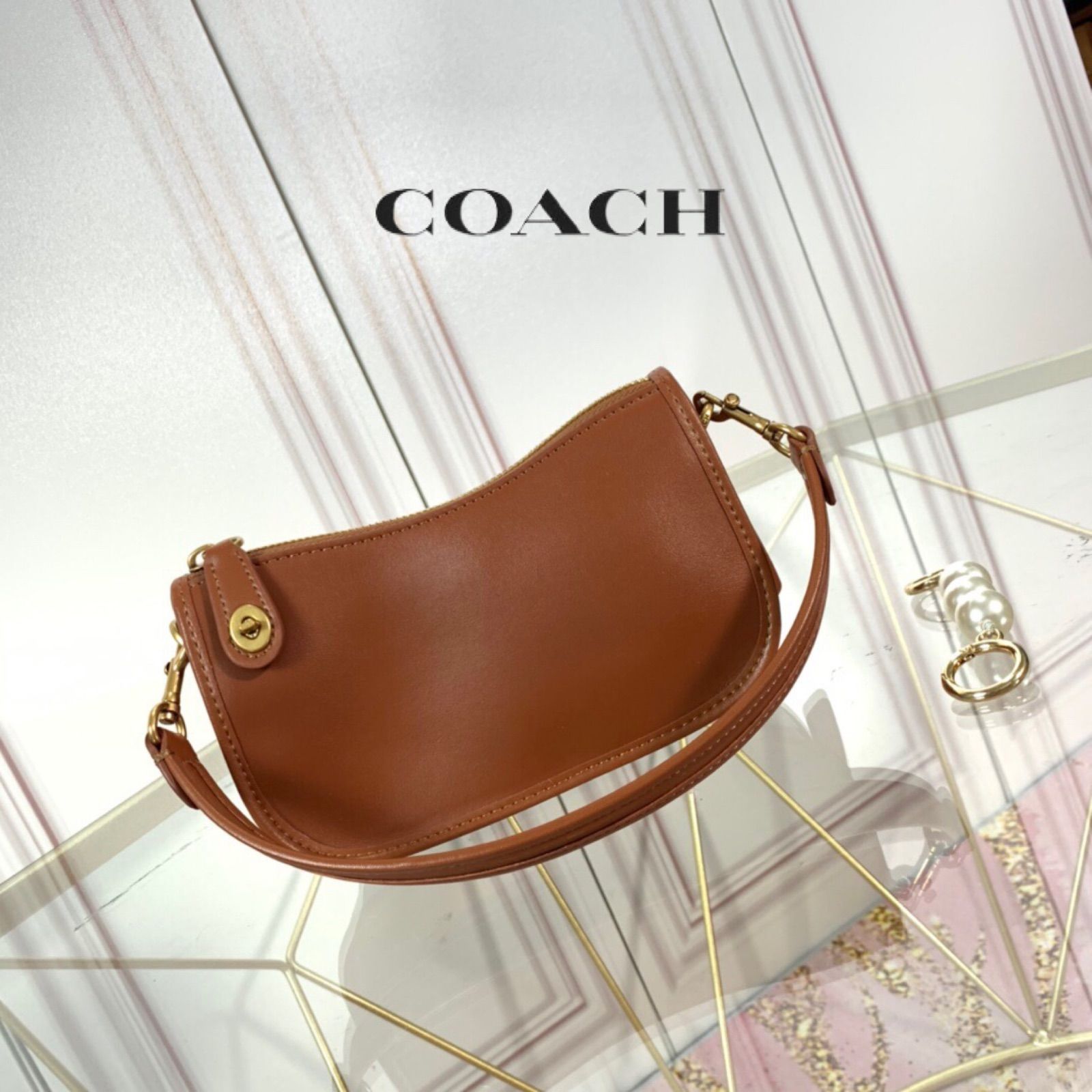 コーチ COACH スウィンガー 20 ミニハンドバック クラッチバッグ ポーチ グラブタンレザー 茶 ブラウン C2643 □GY18 /MW -  メルカリ