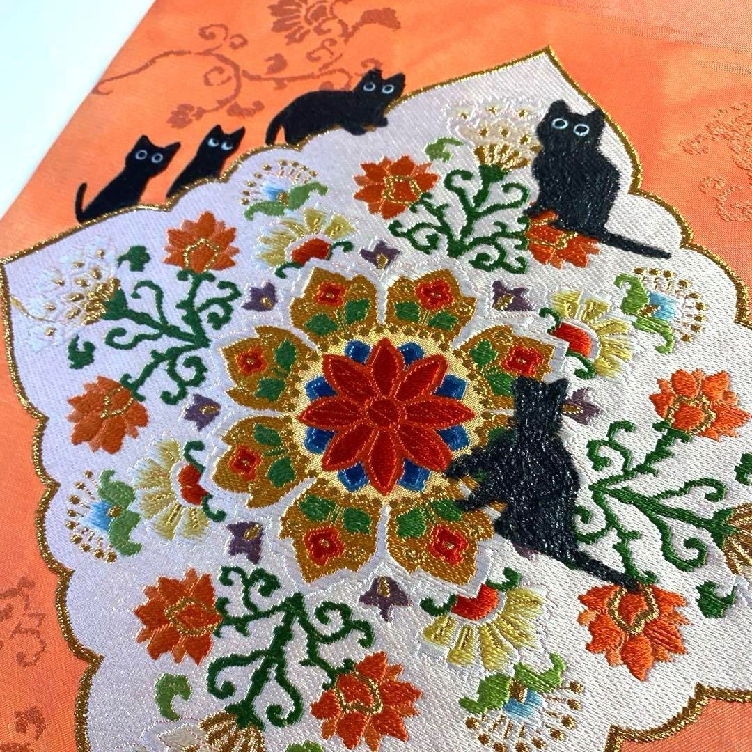 4k780 名古屋帯 絹 唐織 正倉院文様 猫 ピンク 金色 白 黒 赤 緑 花柄  