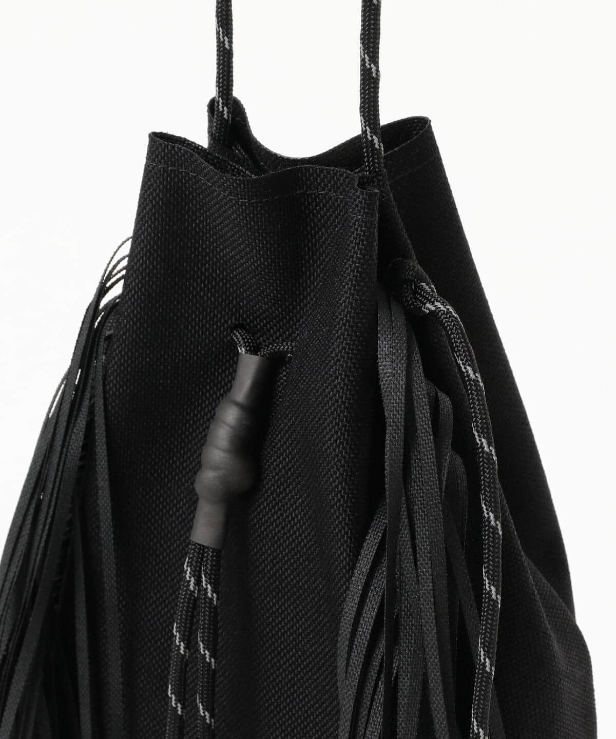 吉岡衣料店 × TAITAI / FRINGE DRAWSTRING BAG - メルカリ